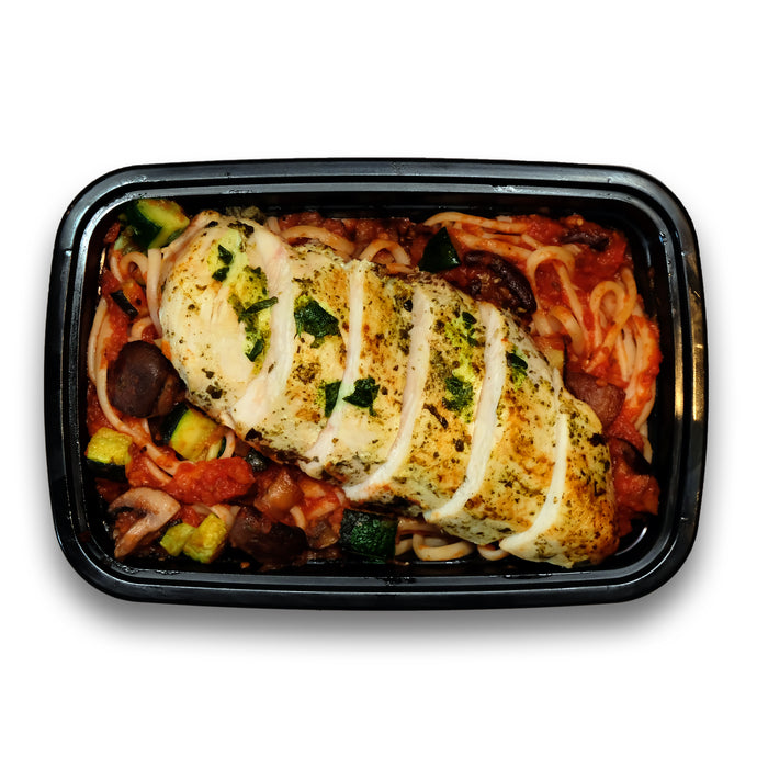 Pesto marinated chicken, served on a bed of linguine tossed in pomodoro sauce, zucchini and mushrooms